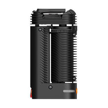 A black, compact, cylindrical Storz & Bickel Crafty+ Vaporizer USB-C Charger with ribbed sides and orange accents, shown from the side on a white background.