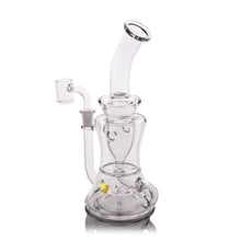 The MJ Arsenal Bloopcycler Dab Rig is a clear glass water pipe featuring a curved neck, round base, side bowl, internal percolator, and a small yellow logo for an elevated dabbing experience.