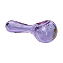 The Ric Flair Drip Spoon Pipe is a translucent purple borosilicate glass hand pipe with a rounded bowl, short stem, and a small decorative graphic near the bowl for added flair.