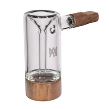 The MJ Arsenal Alpine Series - Steamboat Bubbler is a clear borosilicate glass smoking pipe with wooden accents on the base and mouthpiece, minimalist modern design, and a small etched logo inspired by the Steamboat Bubbler aesthetic.
