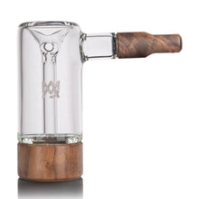 The MJ Arsenal Alpine Series - Steamboat Bubbler features clear borosilicate glass, a cylindrical body, vertical downstem, and wood accents at the base and mouthpiece. The etched MJ Arsenal logo appears on the front against a plain white background.
