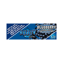 A blue pack of Juicy Jay's Flavored Papers with blueberry images and triple-dipped flavor. Labeled "Not for use with or sold for use with tobacco. Only for use with legal smoking herbs." 1 1/4 size.