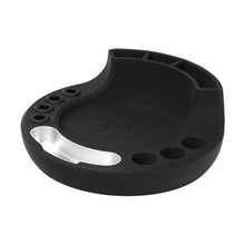 The MJ Arsenal Space Station is a black, curved anti-static silicone mat featuring multiple circular slots, a small metal dish, and several compartments—perfect as a session hub for organizing tools or accessories.