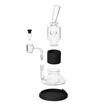 An exploded view of the Softglass Tandem Rig Kit shows customizable borosilicate glass parts—mouthpiece, chamber, bowl, percolator—and a black silicone or plastic base arranged vertically on a white background.