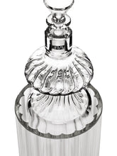 A close-up of the GRAV® Monarch Gravity Bong, made from borosilicate glass, featuring a ridged stopper and scalloped edges with detailed patterns and reflective surfaces.