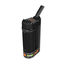 The Storz & Bickel Crafty+ Vaporizer USB-C Charger is a black, portable device with a ribbed exterior, angled mouthpiece, orange accents, display with buttons, and "Crafty" on the front bottom corner.