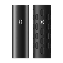 Two black, rectangular devices sit side by side, each with a glowing X-shaped logo. The right one is the PAX Flow Vaporizer with Grip Sleeve Bundle, featuring an outer sleeve with oval cutouts for enhanced grip.