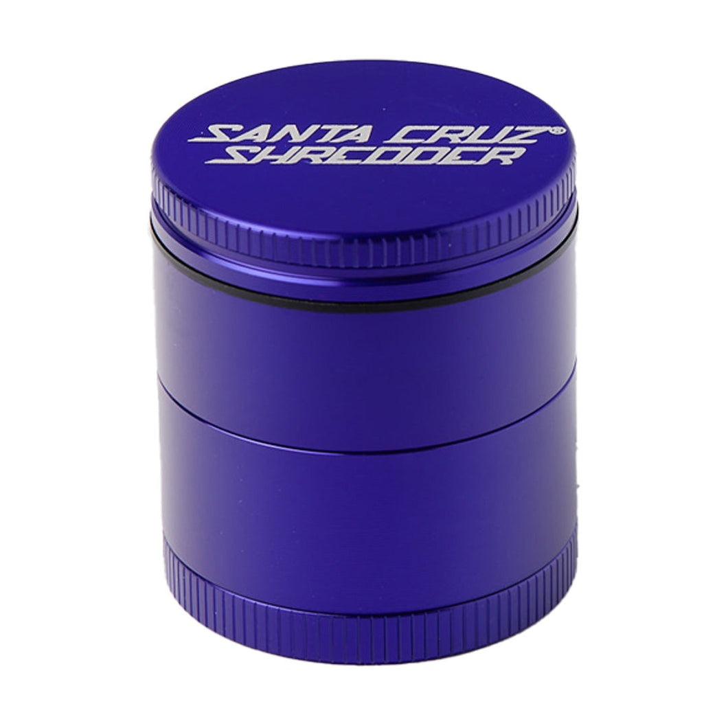The Santa Cruz Shredder Medium 4-Piece Grinder is a blue anodized aluminum, medical-grade herb grinder with 