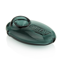 The Grav Pebble Spoon is an oval, teal hand pipe with a side bowl and embossed GRAV logo, shown on a white background.