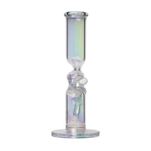 The Human Grade Iridescent Zing Water Pipe is made from clear borosilicate glass with a wide base, cylindrical body, and a striking twisted center design that adds visual interest.