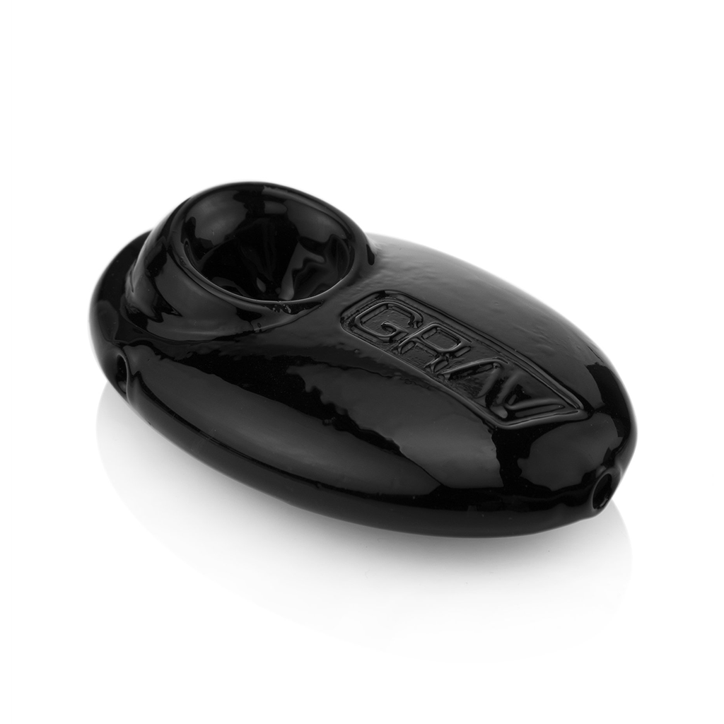 The Grav Pebble Spoon is a glossy black, oval hand pipe with a bowl on one side and 