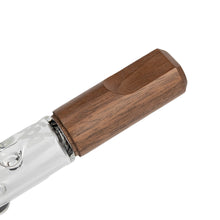 Close-up of the MJ Arsenal Alpine Series Ridge Chillum Taster One Hitter, featuring borosilicate glass with etched patterns and a cylindrical dark wooden cap with smooth edges and a polished finish.