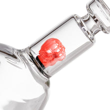 A close-up of the MJ Arsenal x Tyson 2.0 Punch-Out, a clear borosilicate glass bubbler bottle with a small red skull embedded inside the neck near the opening.