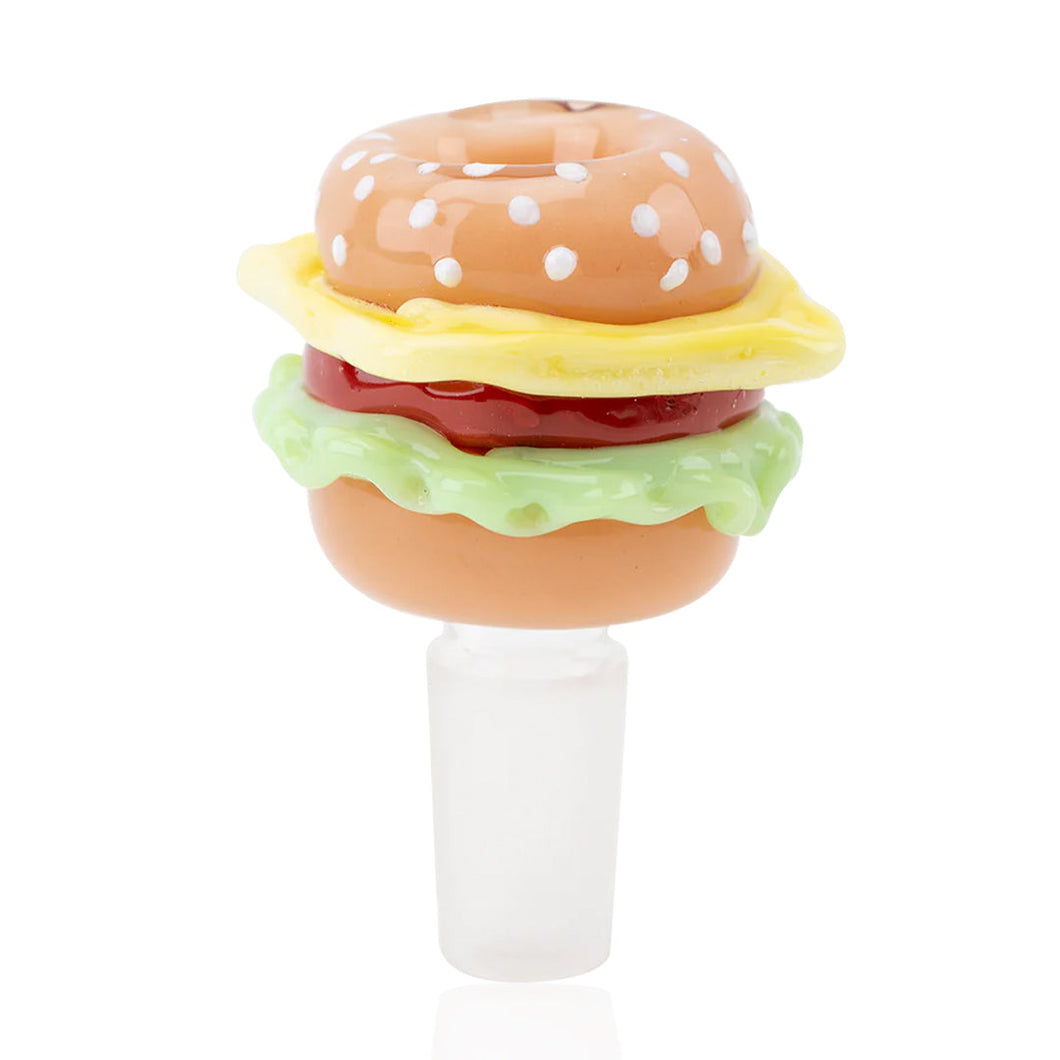 The Empire Glassworks Burger Bowl 14mm is a handcrafted borosilicate glass bowl shaped like a cheeseburger, featuring layers of bun, cheese, tomato, and lettuce with a frosted base—ideal as a unique bowl or decorative stopper.
