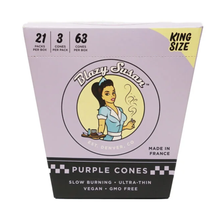 A box of Blazy Susan Purple Paper Cones featuring a cartoon woman with a tray. Contains 21 packs (3 cones each), totaling 63 GMO-free, slow-burning king size cones—ideal for anyone who enjoys purple pre-rolled cones.