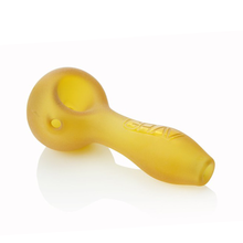 The Grav Sandblasted Spoon is a yellow pipe with a matte finish, rounded deep bowl, straight handle, and the embossed word GRAV on the side, shown against a white background.