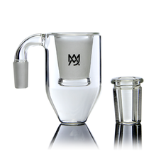 The MJ Arsenal Reclaim / Dry Ash Catcher is a clear glass cup with a side spout and matching lid, both with frosted accents. Its modern design features a bold black logo on the front and is shown against a white background.