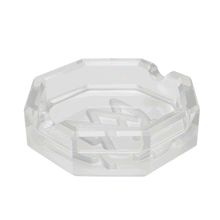 The MJ Arsenal Pegasus Ashtray is a clear, octagonal glass luxury piece featuring three cigarette grooves, displayed on a white background.