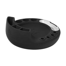 The MJ Arsenal Space Station is a round, black silicone ashtray with a silver metallic rim section, designed as a session hub featuring multiple slots for smoking accessories.