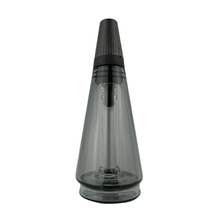The Puffco Peak Travel Glass is a conical, transparent grey glass container with a black textured lid, designed for the Puffco Peak Pro and displayed on a plain white background.