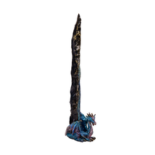 The Fantasy Tower Incense Burners feature a tall, jagged black and gold hand-painted resin rock with a small blue and purple dragon sitting at its base, perfect as a decorative sculpture for any fantasy-themed setting.