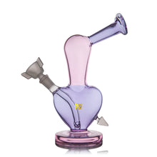 The MJ Arsenal Burning Heart (Valentine’s 2024) is a Limited Edition pastel purple and pink borosilicate glass water pipe with an abstract heart shape, tilted neck, flared mouthpiece, and gold crown logo—perfect for Valentine’s Day.