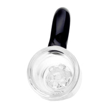 A clear borosilicate glass cup with a black handle is shown from above, revealing a flower-shaped design at the bottom that resembles the Human Grade Horn Glass Bowl Slide 10mm/14mm.